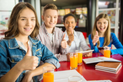 teenagers doing thumbs up