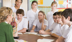 students and teacher having class